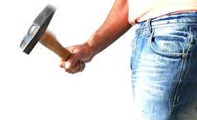 Man hits woman with a hammer for confronting him over girlfriend