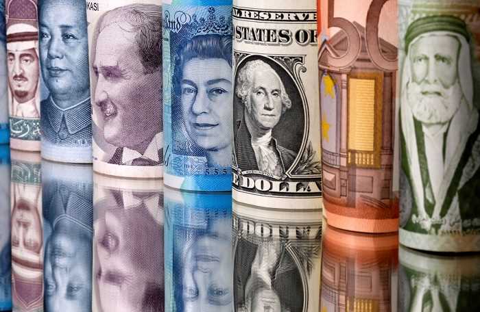Dollar ascendant; sterling slumps on lower rate expectations, bleak outlook