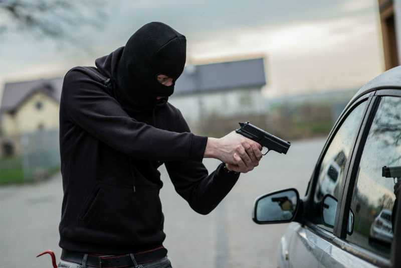 Two armed robbery suspects hit in police shootout